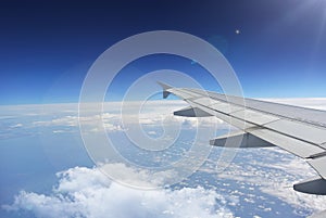 Clouds under the wing of an airplane