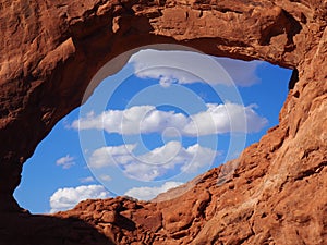 Clouds through Window Arch, Arches National Park, Utah