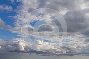 Cloudscape above the river before rain, weather background