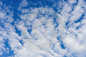 Cloudscape with altocumulus clouds, Altocumulus middle-altitude cloud in stratocumuliform - natural background photo