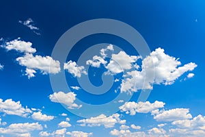 Cloudscape background of bright blue sky