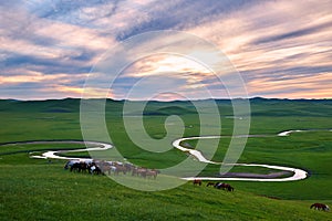 The cloudscape and curving river sunset