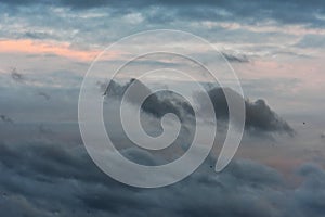 Cloudscape, dramatic Clouds at Sunset near the Ocean