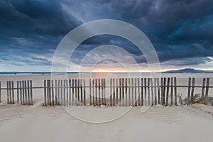 Cloudscape over beach and ocean in Spain, before storm
