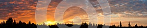 Cloudscape panorama of sunrise