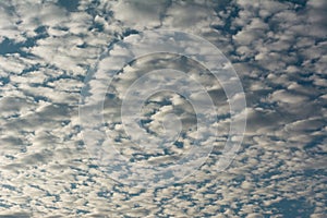 Cloudscape with stratocumulus clouds. Clouds texture.