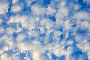 Cloudscape with stratocumulus clouds, clouds texture. Nature background.