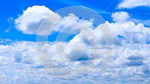 Cloudscape of summer blue sky background and white clouds in sun