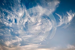 cloudscape with white altocumulus clouds at evening