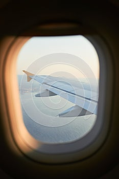 Cloudscape from window airplane, landscape of wing plane on a cloudy sky