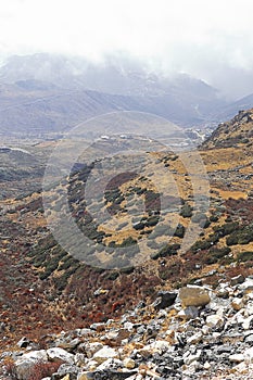 cloudy alpine landscape of nathang valley, high himalaya region of east sikkim near controversial doklam plateau