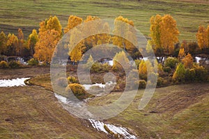 Cloudy autumn landscape with river