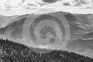 Cloudy black and white mountains