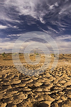 Cloudy Blue Sky Above Parched Barren Land In Morocco