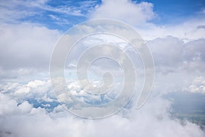 Cloudy and blue sky for background. nature background white cloud and blue sky view from airplane windows.