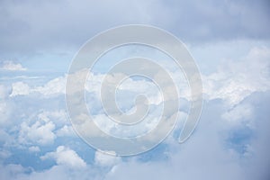 Cloudy and blue sky for background. nature background white cloud and blue sky view from airplane windows.