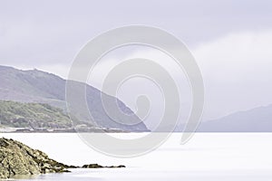 A cloudy dawn on Loch Hourn water on Isle of Skye