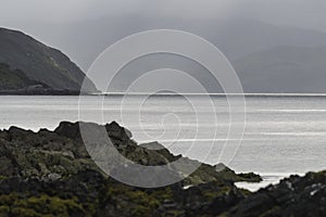 A cloudy dawn on Loch Hourn water on Isle of Skye