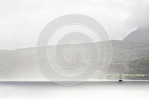 A cloudy dawn on Loch Hourn water on Isle of Skye