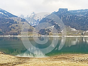 Cloudy day during late winter on the WÃ¤gitalersee Waegitalersee or Wagitalersee Lake in the WÃ¤gital / Waegital or Wagital