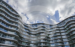 Cloudy day in London - Battersea Bridge, modern glass building.