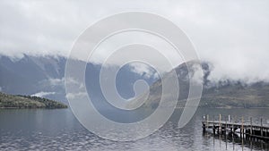 Cloudy day at Rotoiti lake with mountain views, New Zealand