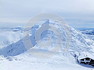 Cloudy day, snowy mountain peaks, cold winter day, Tatra Mountains,