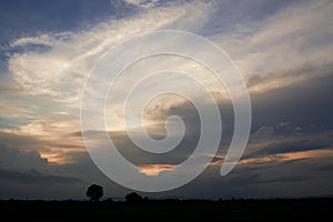 Cloudy evening sky and sunset.