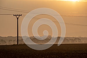 cloudy and foggy sunrise over slovakian landscape in autumn