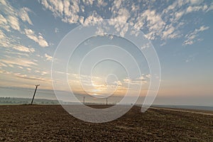 cloudy and foggy sunrise over slovakian landscape in autumn