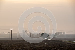 cloudy and foggy sunrise over slovakian landscape in autumn