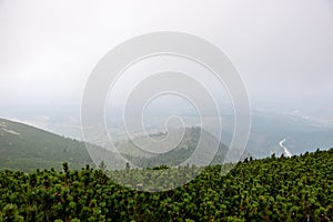 cloudy and foggy sunrise over slovakian landscape in autumn