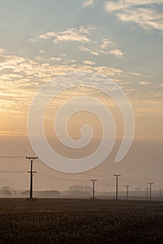 cloudy and foggy sunrise over slovakian landscape in autumn