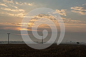 cloudy and foggy sunrise over slovakian landscape in autumn