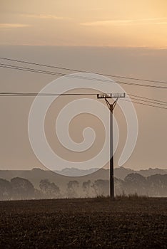 cloudy and foggy sunrise over slovakian landscape in autumn