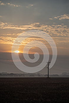 Cloudy and foggy sunrise over slovakian landscape in autumn