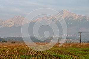 Cloudy and foggy sunrise over slovakian landscape in autumn