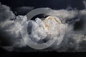 Cloudy full moon night sky