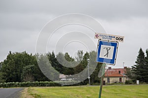 Cloudy landscape of golf course entrance on overcast day in Selfoss South Iceland