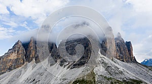Cloudy morning shot of picturesque Tre Cime di Lavaredo formation 2999m in Dolomite Alps. Beauty in Nature mountain concept photo