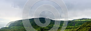 Cloudy mountains of flores, acores islands photo