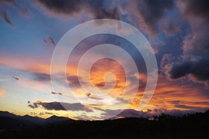 Cloudy orange sky at sunset, nature background