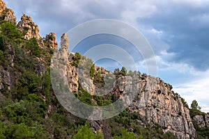 Cloudy rocky landscape on the banks of the swamp