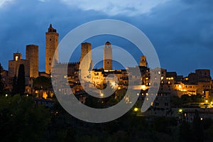 Cloudy September twilight over medieval San Gimignano. Tuscany, Italy