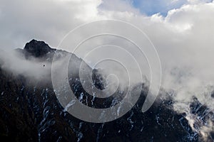 Cloudy sharp mountains