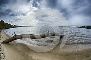 Cloudy skies over body of water