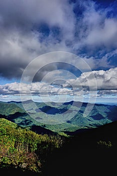 Cloudy skies over mountain tops