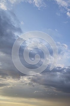 Cloudy sky with heavy clouds and sunlights. weather concept