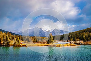 Cloudy Sky Over Fall Mountains At Cascade Ponds