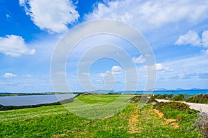 Cloudy sky over Fiume Santo shoreline